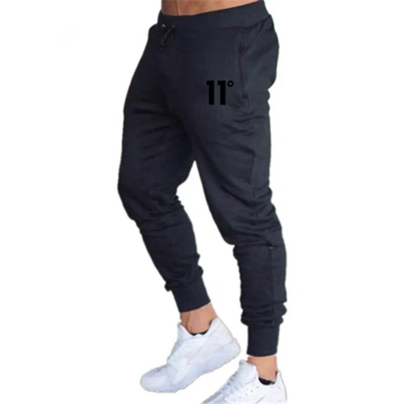 Hot sale solid casual Mens Casual Slim Fit Tracksuit Sports Solid Male Gym Cotton Skinny Joggers Sweat Casual Pants Trousers